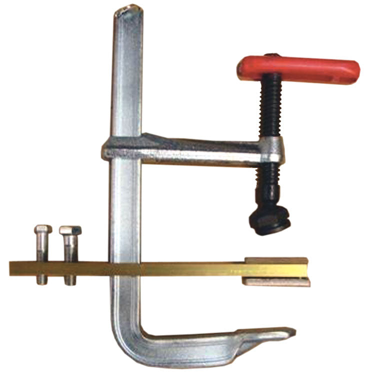 Heavy-Duty Contact Clamp by Magnaflux, showcasing a robust design with a red grip handle and a strong clamping mechanism, ideal for precise inspections of large parts.