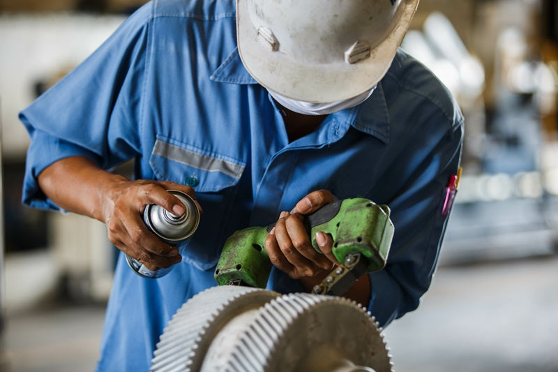 Photo of a technician performing Magnetic Particle Inspection with a Magnaflux Y-2 Yoke