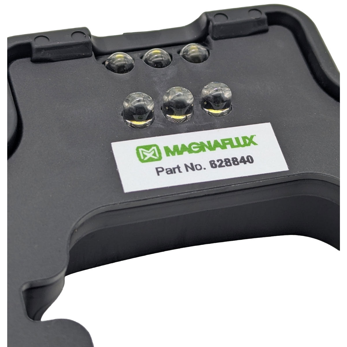 Close-up image of the activation interface of the Magnaflux Y-2 Yoke Light, displaying part number and LED mount for focused inspection lighting.