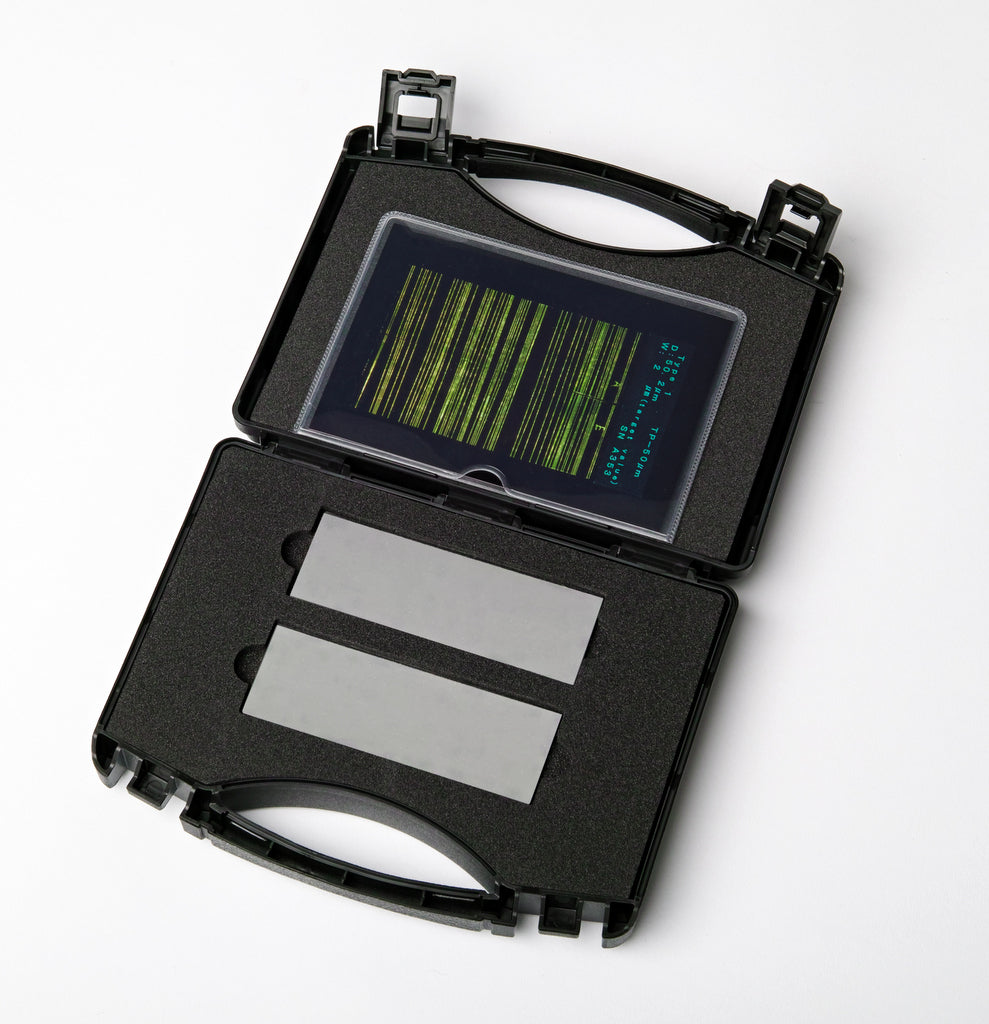 Magnaflux NiCr 20 Micron Panels displayed in a protective case, featuring two twinned nickel-chrome alloy test panels designed for comparative penetrant system testing.