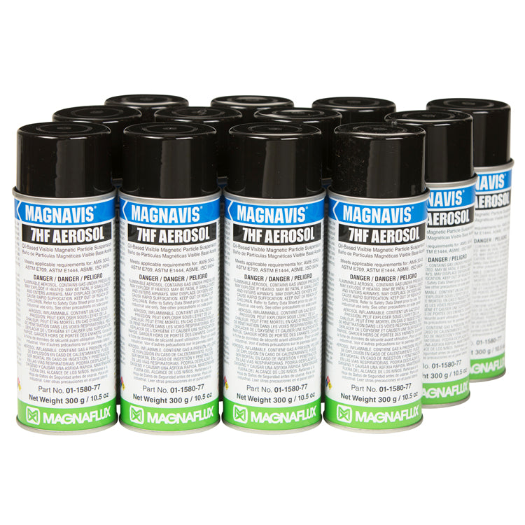 A collection of Magnaflux 7HF Black Non-Fluorescent Particle aerosol cans, showcasing the product's design and branding for visible magnetic particle testing.