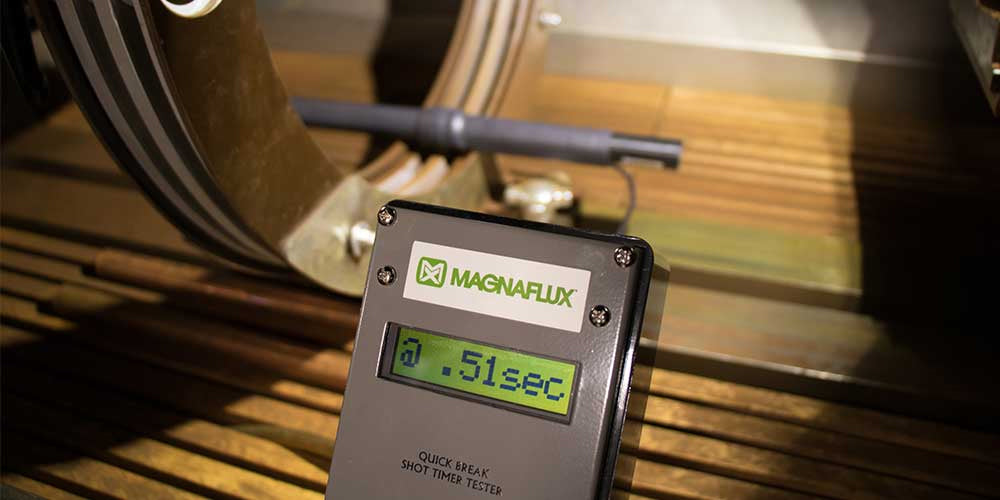 Image of a Mangnaflux QB-2 quick break tester in use