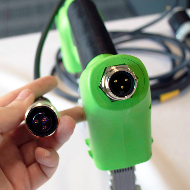 Magnaflux Y-2 AC Yoke 115V in use, demonstrating powerful magnetic field for surface testing.