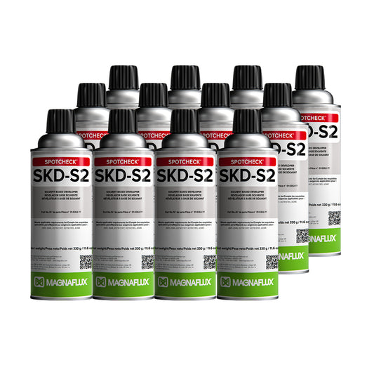 Multiple bottles of Magnaflux SKD-S2 on a white background